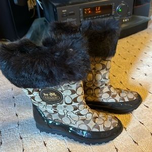 Coach brand all weather boots. Worn only a few times. Great pair of boots!